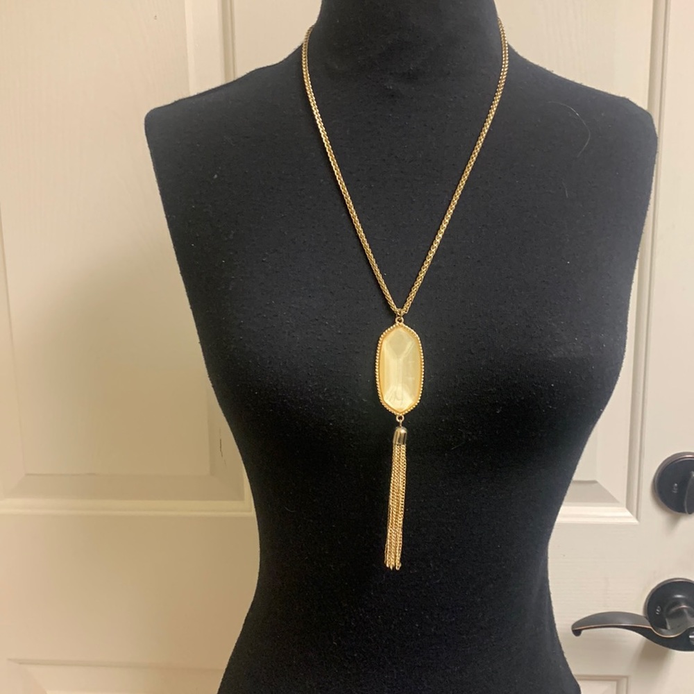 Necklace, Gold chain with light golden center piece with gold tassel, Length 28”